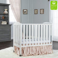 Dream on Me 2 - in - 1 Folding Portable Mini Crib in White. Mattress Pad Included. Easy to Fold and Store Baby Crib. Two Adjustable Mattress Height Positions Convertible Crib