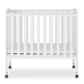 Dream on Me 2 - in - 1 Folding Portable Mini Crib in White. Mattress Pad Included. Easy to Fold and Store Baby Crib. Two Adjustable Mattress Height Positions Convertible Crib