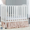 Dream on Me 2 - in - 1 Folding Portable Mini Crib in White. Mattress Pad Included. Easy to Fold and Store Baby Crib. Two Adjustable Mattress Height Positions Convertible Crib